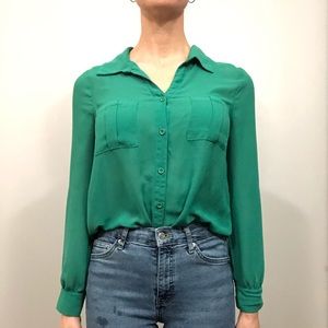 Green blouse.